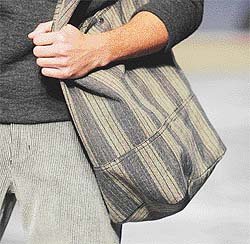 The footwear and the bag you sport set you apart in a crowd
