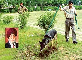 A sniffer dog at the site of murder of Gurcharan Singh, Chairman, IET Bhaddal