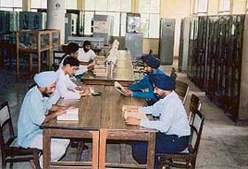 Students read in the Punjabi Bhavan Library