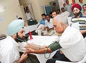 A health check-up camp in progress at SBI Staff Colony in Sector 42