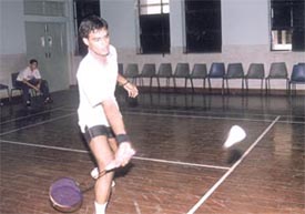 Parminder Chawda in action in the Tirath Ram Badminton Torunament