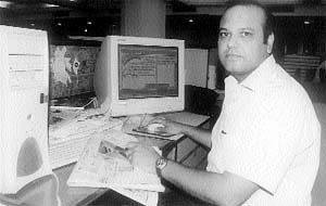 A cartoonist in his office