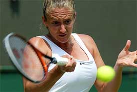 France's Mary Pierce returns to Eleni Daniilidou of Greece