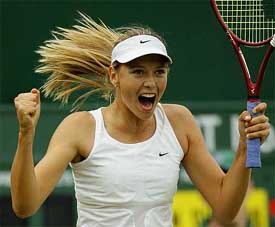 Russia's Maria Sharapova celebrates her victory over compatriot Elena Bovina