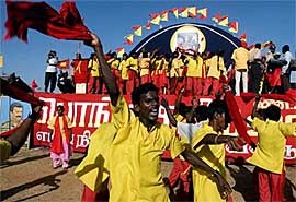 Supporters of Sri Lanka's Tamil Tiger rebels dance at a cultural show
