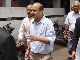 Senior IAS officer Ajit Mohan Sharan is produced in a court in Ambala on Saturday