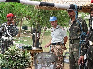 Army personnel along with a UN Observer