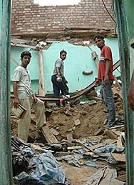 The debris of a two-storey house that collapsed in Amritsar on Saturday, leaving three injured and one eight-month-old infant dead
