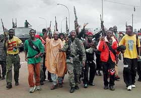Liberian government forces, who claimed to have retaken Liberia's key port on Friday