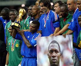 France's captain Marcel Desailly holds the Confederations Cup trophy