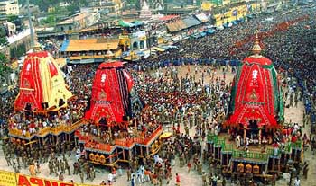 Thousands of devotees pull Lord Jagannaths chariot on the occasion of the Rath Yatra in Puri on Tuesday.