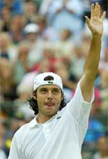 France's Sebastien Grosjean celebrates his victory over Juan Carlos Ferrero of Spain