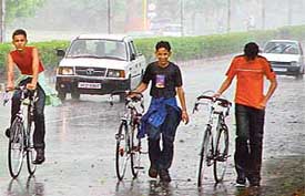 Boys enjoy monsoon showers in Chandigarh