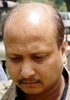 File photo of Ajit Mohan Sharan outside a court in Ambala.
