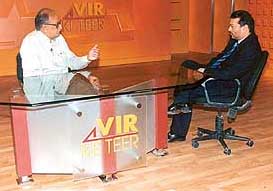 Sanghvi (in black suit) in Vir Ke Teer: Incisive show