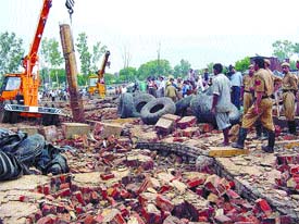 The scene of wall collapse in Nangloi in the Capital on Friday