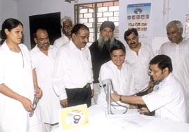 Mr Yoganand Shastri, MLA, being examined at a free health check-up camp at Begumpur