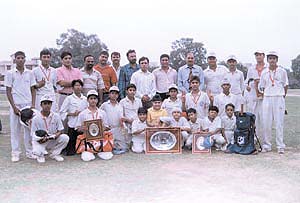 The Lal Bahadur Shastri Cricket team, which won the Turf Cricket Tournament title, with their trophies