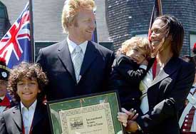 Boris Becker and his ex-wife Barbara smile during a family photo session