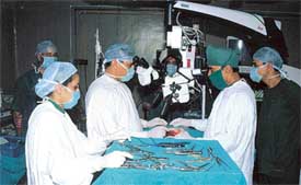 Spinal surgery being performed through neuro-surgery microscope at Command Hospital, Chandi Mandir