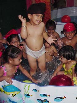 Children of Swiss International Public School have fun at a pool party 