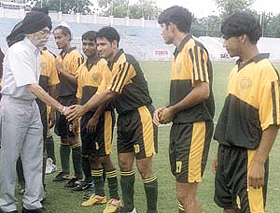 A founder member of the Delhi Soccer Association M. S. Batra being introduced to the players before the start of the DSA A Division Championship at the Ambedkar Stadium.