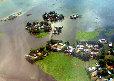 An aerial view of a flooded village in the Gowalpara district of Assam