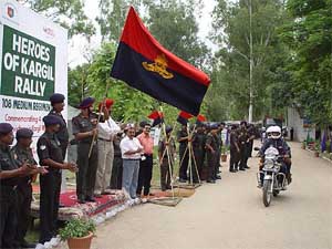 Brig K. S. Sethi flags off an Army motorcycle rally