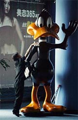 A worker cleans Warner Bros cartoon character Daffy Duck 