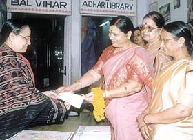 A cheque of Rs two lakh being presented by Mrs Urmila Jain on behalf of the NTPC to Vidya, an NGO involve in empowerment of the underprivileged in the Capital