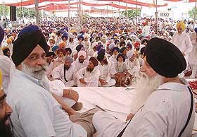 Newly elected president Ravi Inder Singh with former SGPC chief Jagdev Singh Talwandi