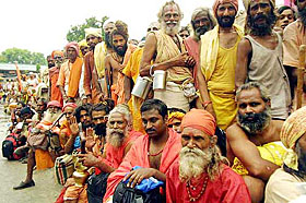 Sadhus waiting outside Maulana Azad Stadium in Jammu on Saturday for their registration to the holy shrine of Amarnath
