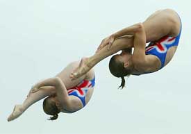 Great Britains Tandi Gerrard and Jane Smith dive in the womens synchronised three metres preliminaries 
