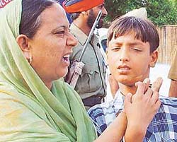 Gagandeep Singh along with his mother, Gurnaam Kaur, at the SPs office in SAS Nagar 
