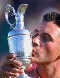 Ben Curtis of the US kisses the British Open trophy