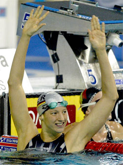 Germanys Antie Buschschulte celebrates her victory at the 100 metre backstroke semifinal 