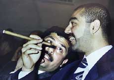 An undated file photograph of Saddam Hussein's sons Qusay and Uday