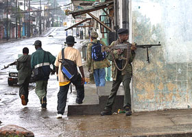 Fighters of Liberian President Charles Taylor patrol the streets of Monrovia 