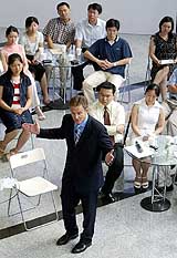 British Prime Minister Tony Blair speaks during an informal question and answer session at Tsinghua University in Beijing on Tuesday. 