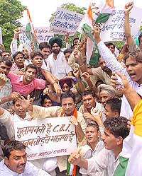 Indian Youth Congress President Randeep Singh Surjewala leads his supporters as they raise slogans against the sellout of the rule of law and constitutional norms by the CBI during a demonstration in front of CBI headquarters 