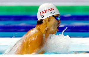 Japans Kosuke Kitajima swims during the 200-metre breaststroke heat