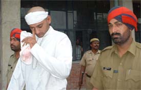Gurjinder Singh accused of kidnapping the daughter of Superintendent of Police S.S Bhatti comes out after a court hearing in Ludhiana