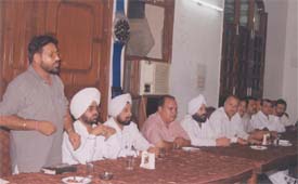 Councillor Sat Pal Puri  at a press conference convened by Congress councillors