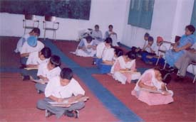 Participants appear for a test prior to the science seminar conducted by the District Education Department in Ludhiana 