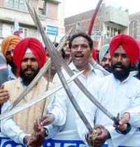 Armed Youth Congress activists protest the recent killings of Vaishno Devi pilgrims 