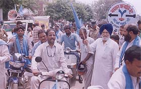 Mr Charanjit Singh Atwal, former Speaker, Punjab Vidhan Sabha, flags off a scooter-cum-motorcycle rally by the Adi Dharam Samaj in Ludhiana