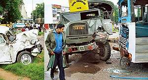 A Punjab DIGs car (left) that rammed into an Army truck carrying schoolchildren at the Sectors 27 and 28 traffic lights on Monday 
