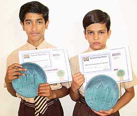 Rudra Mukherjee (left) and Kirti Gahlawat, both of Manav Mangal School, Sector 11, Panchkula who won gold medals in the 12th World Cup of Olympic Yoga 