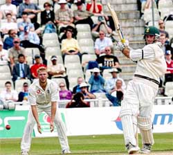 South African captain Graeme Smith pulls England's Stephen Harmison