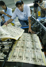 Japan's new 10,000 yen notes are printed at the National Printing Bureau plant in Tokyo 